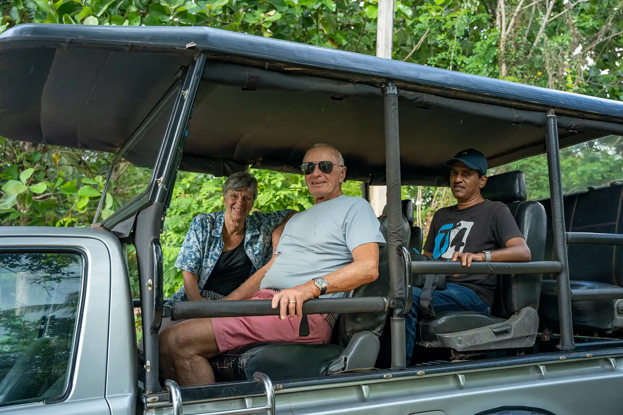 A safari jeep travelling through Yala National Park